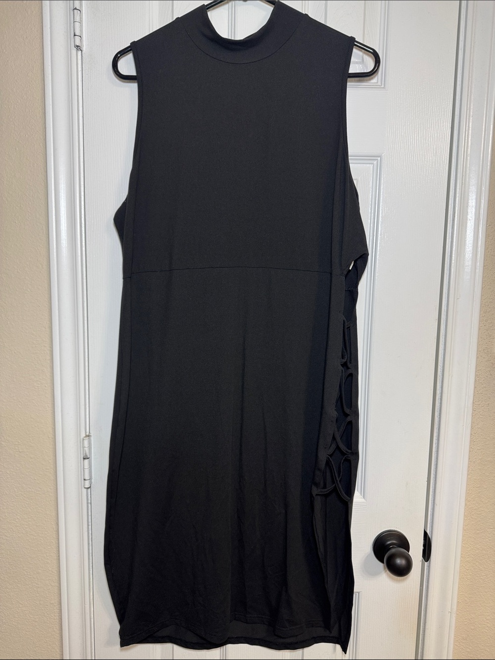 Black Sleeveless Mock Neck Mini Dress with Side Cutouts